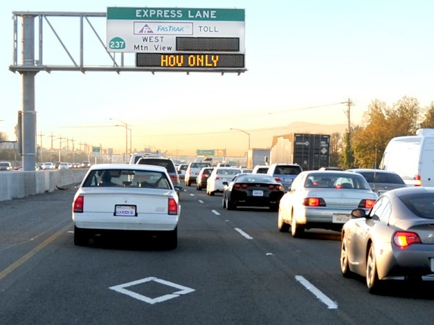 a car on the express lane during HOV ONLY mode